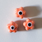 Bloemetje met oogje - keramisch porselein