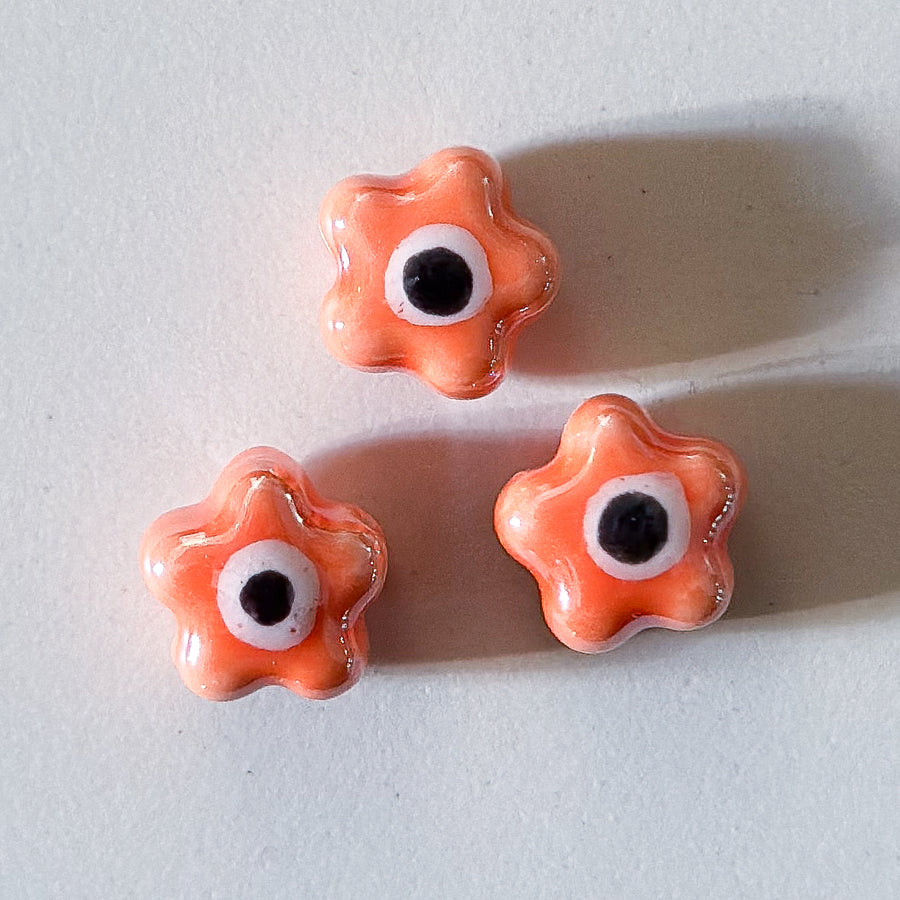 Bloemetje met oogje - keramisch porselein
