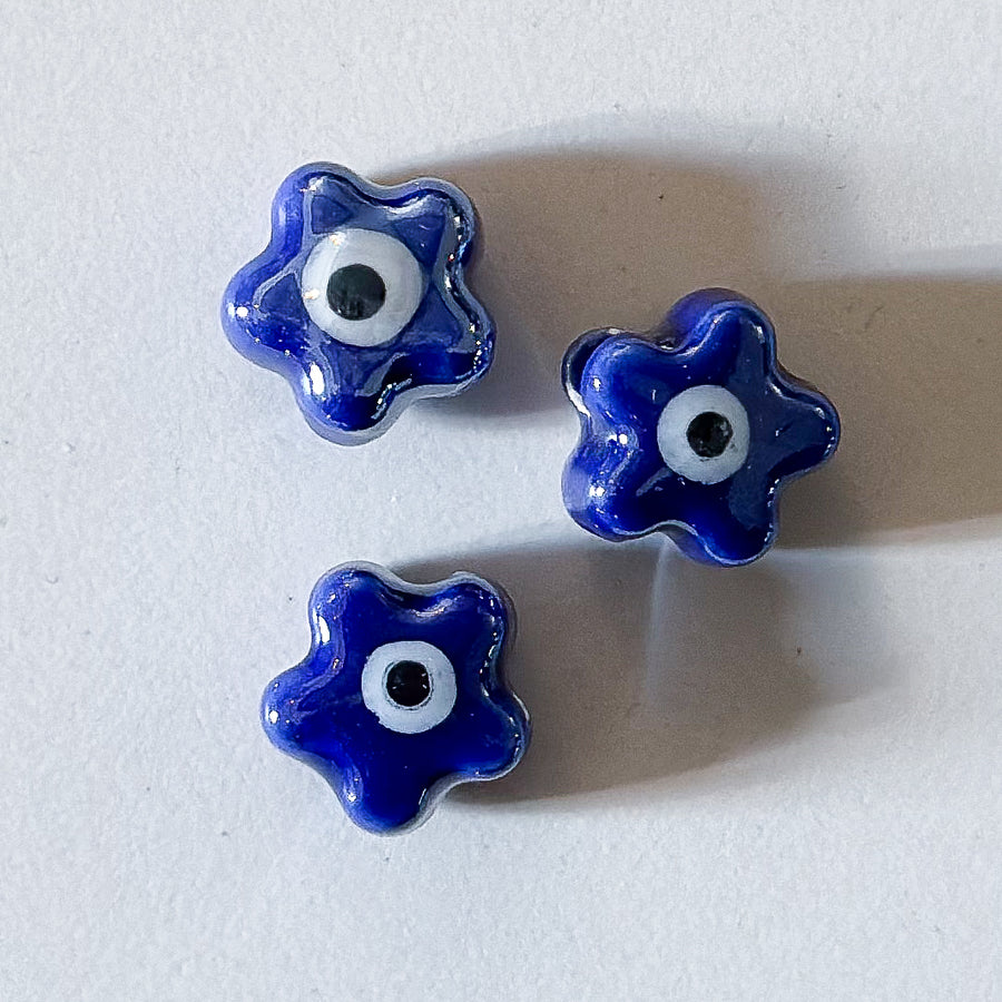 Bloemetje met oogje - keramisch porselein