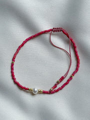 Schuif armbandje miyuki kraaltjes en pareltje - koraal