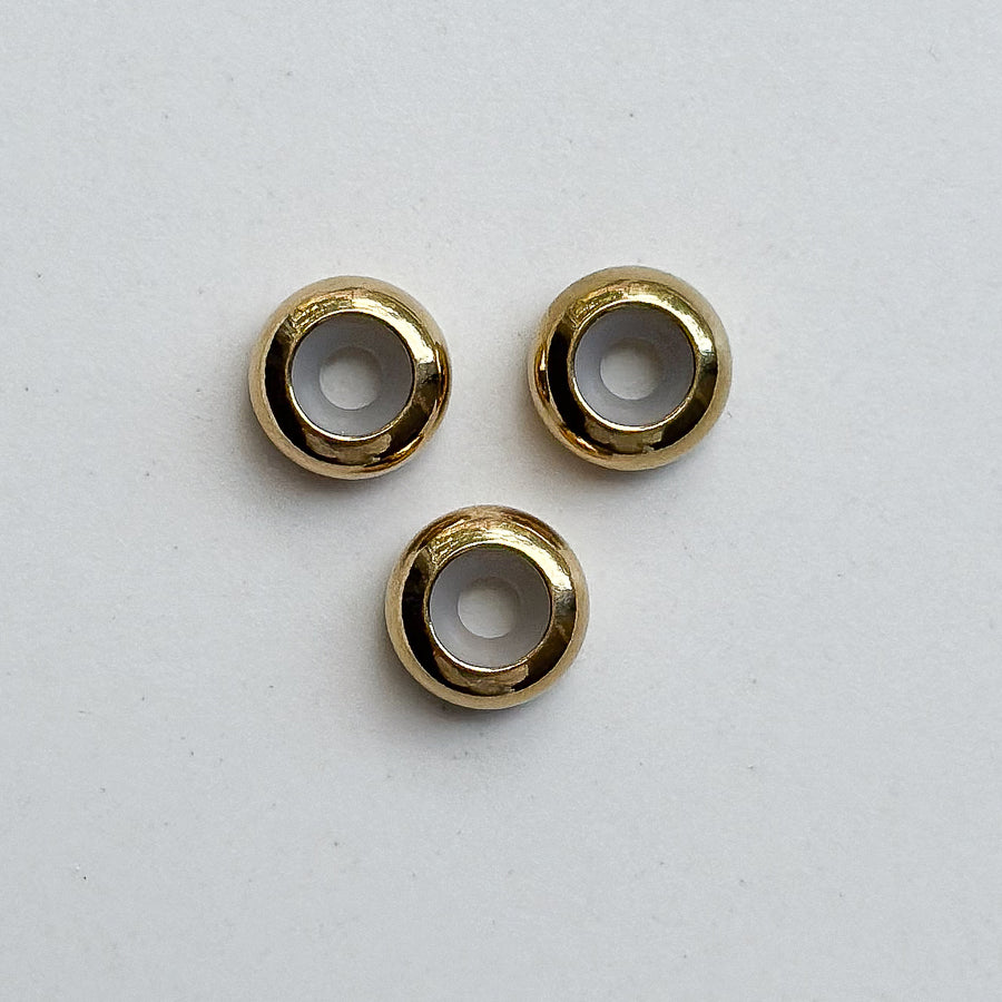 Gold sliding beads