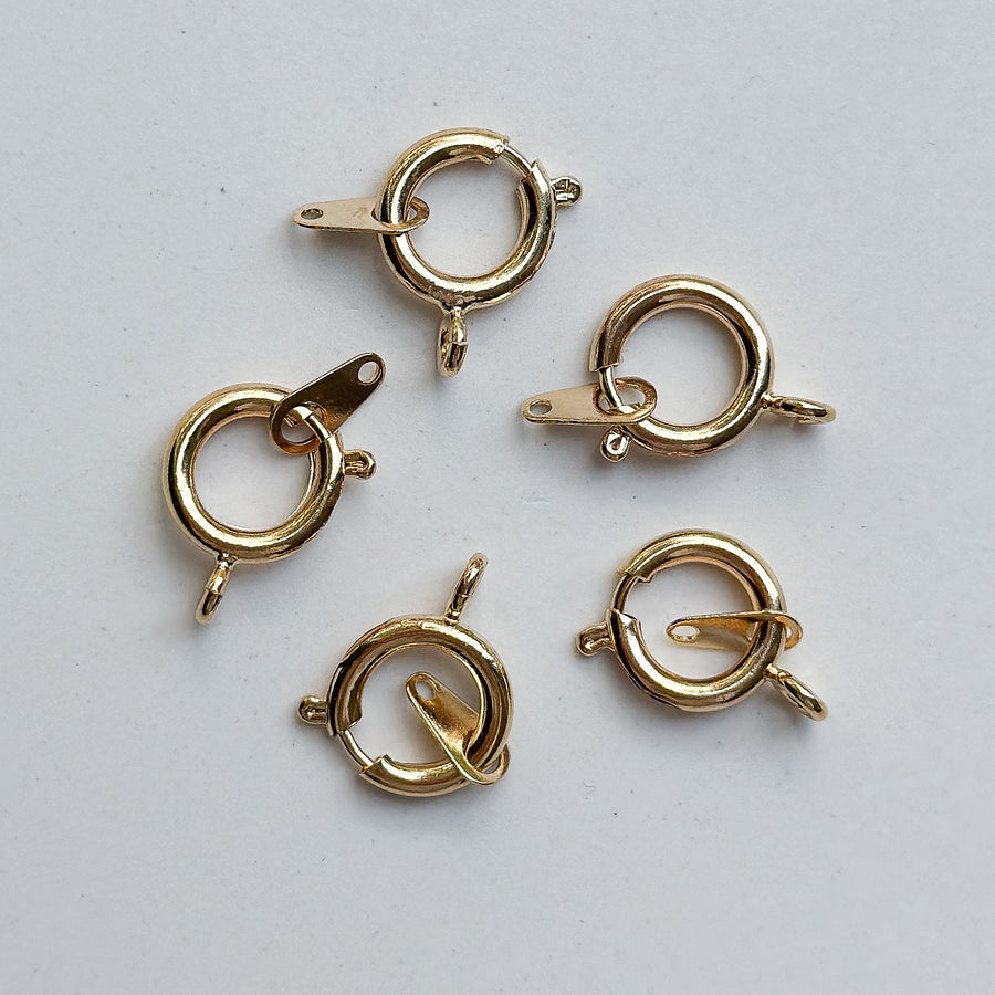 Gold spring clasp