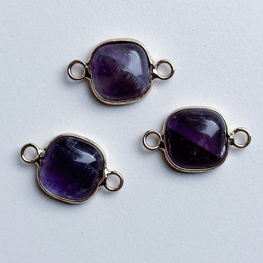 Charm natural stone 2 eyes - amethyst