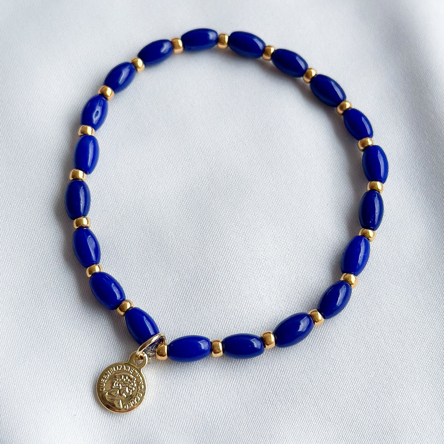 Armbandje glaskraaltjes op elastiek - donker blauw