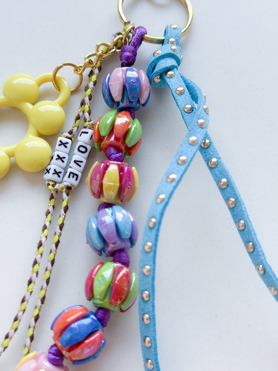 Bag charm Happy - geel