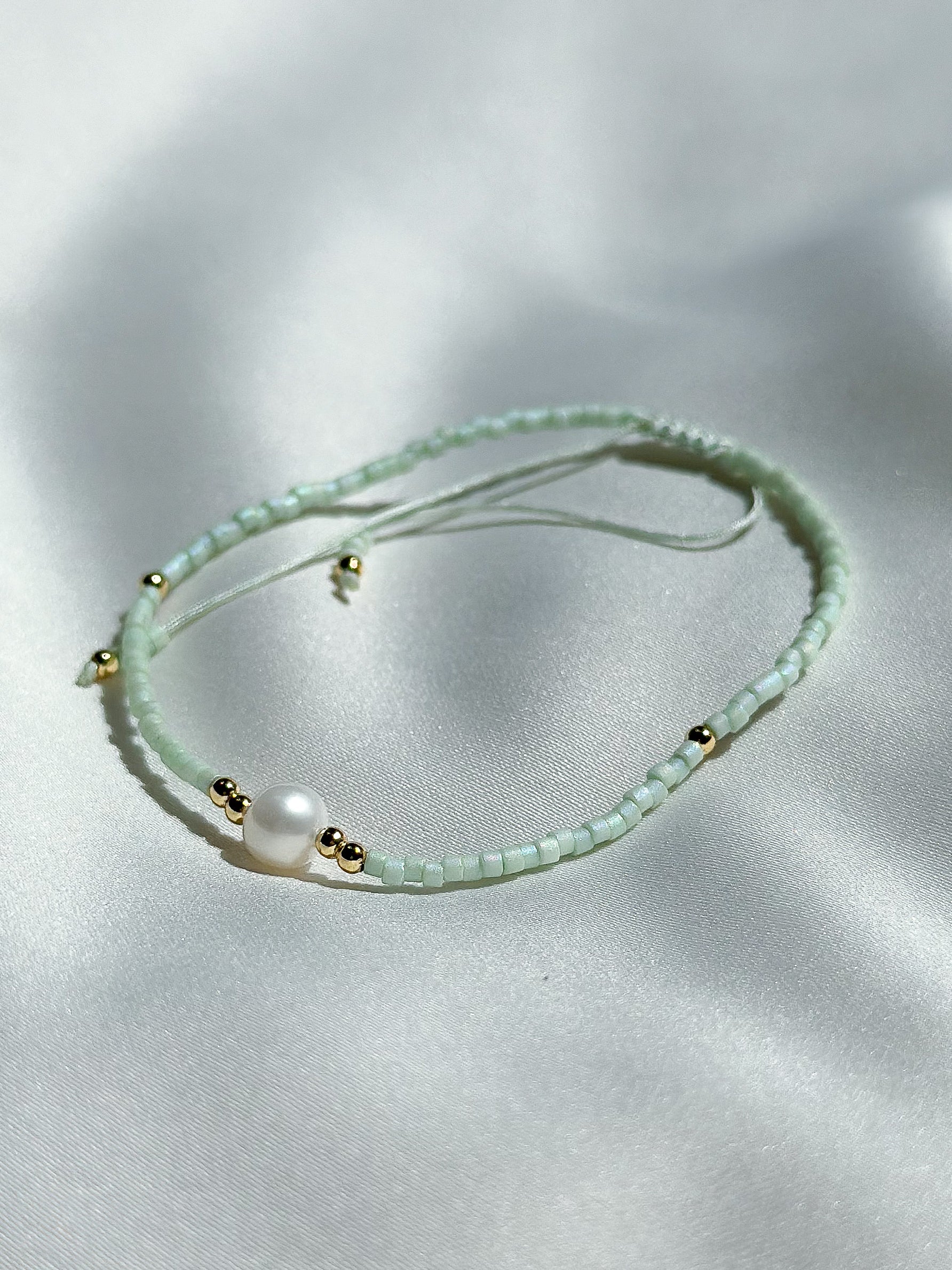 Schuif armbandje miyuki kraaltjes en pareltje - mint