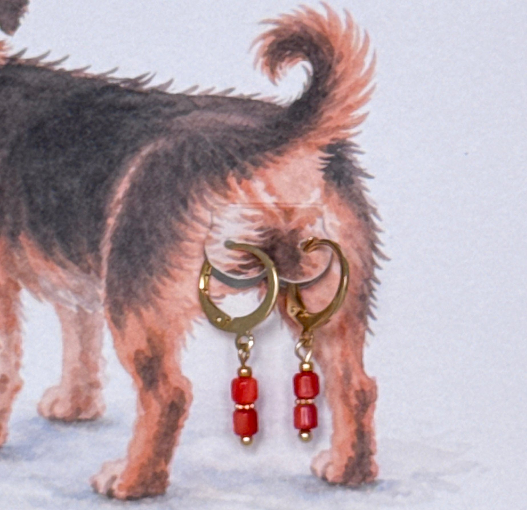 Hond - oorbel oranje /rood