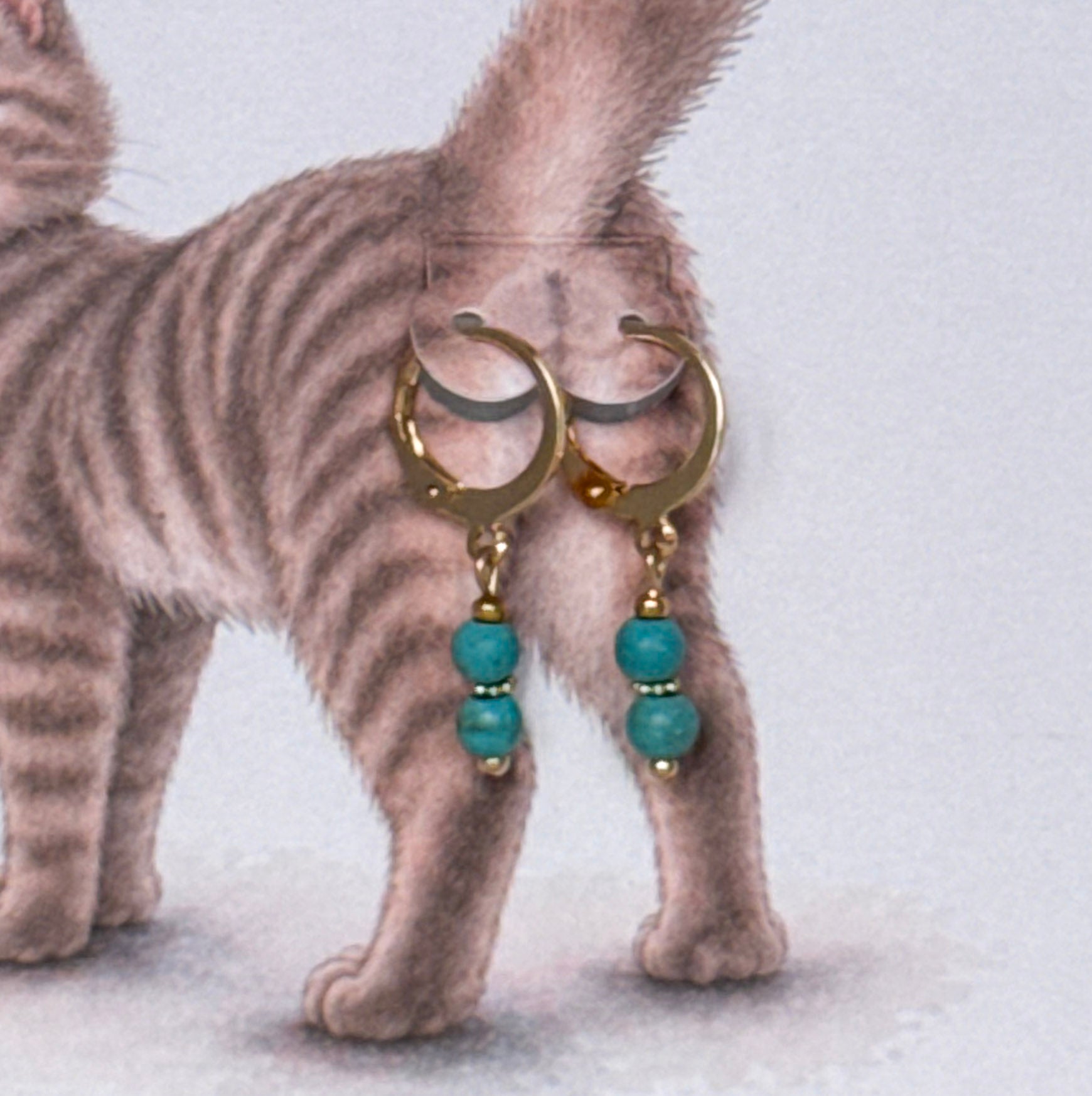 Poes - oorbel turquoise